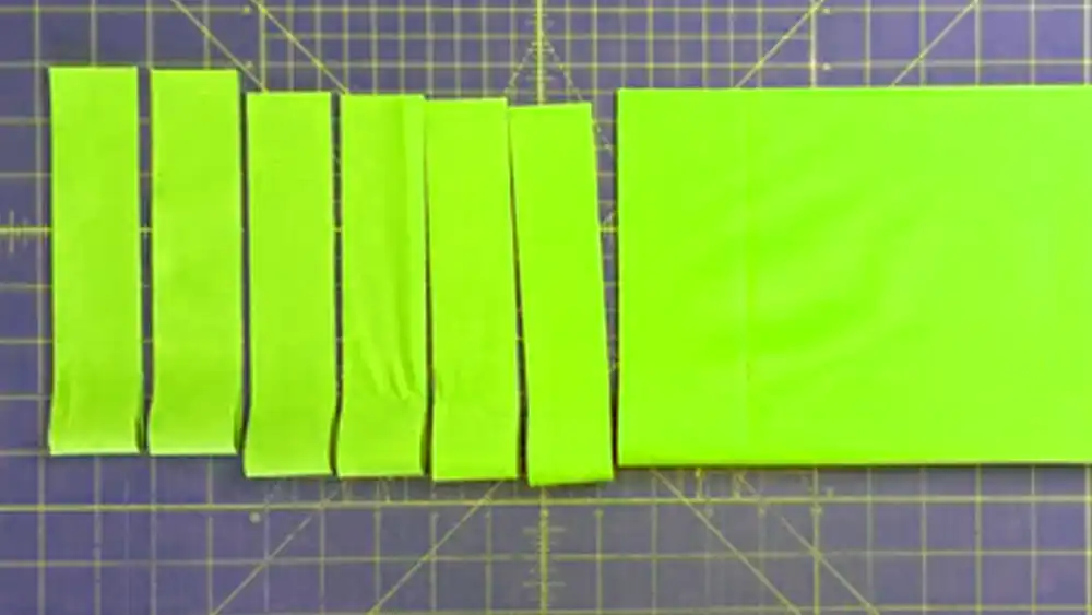 how to cut long strips of fabric for quilting