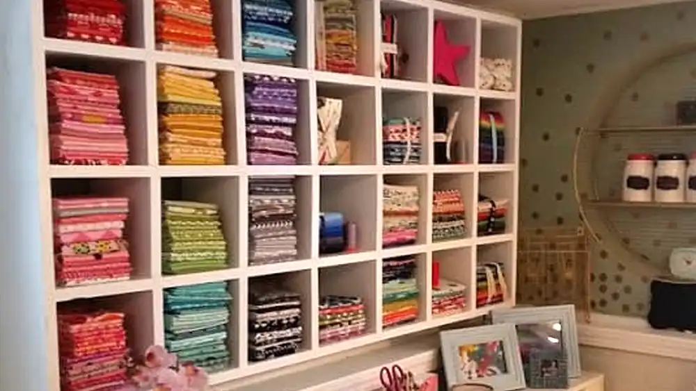 quilt fabric storage on the wall