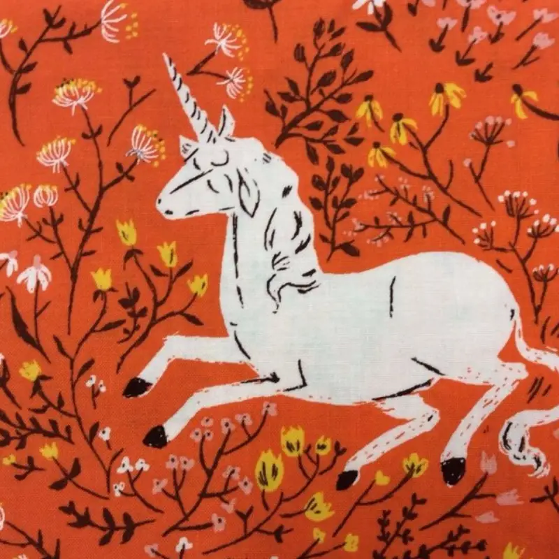 unicorn with orange flowers quilting fabric
