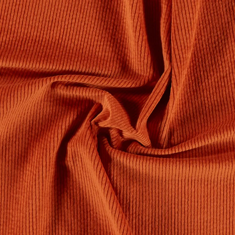 Dark orange corduroy fabric