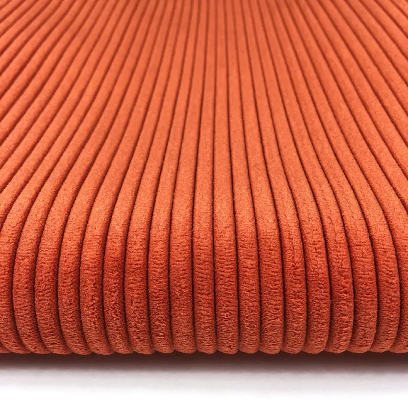 Wide wale orange corduroy fabric