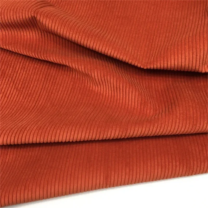 Shiny rust corduroy fabric