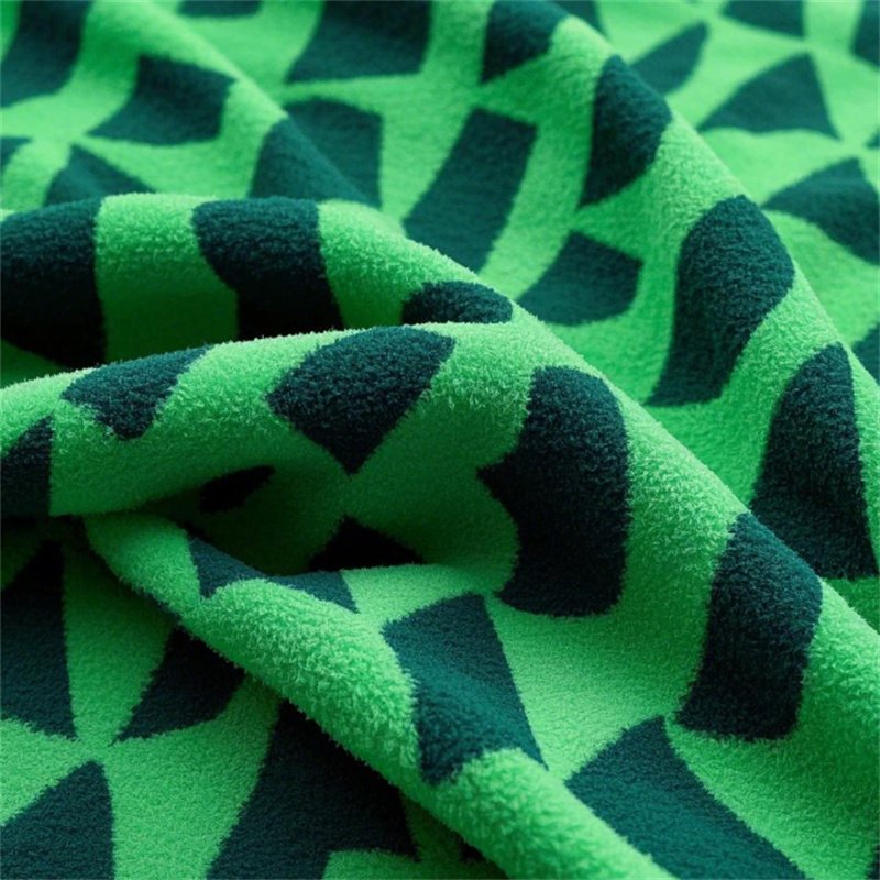 Geometric Patterned Green Polar Fleece fabric