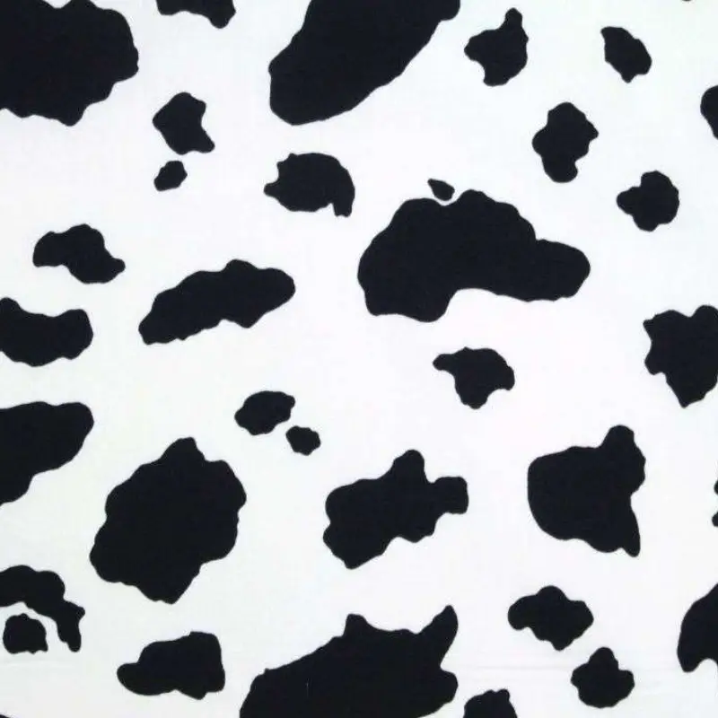 white cotton cow print fabric