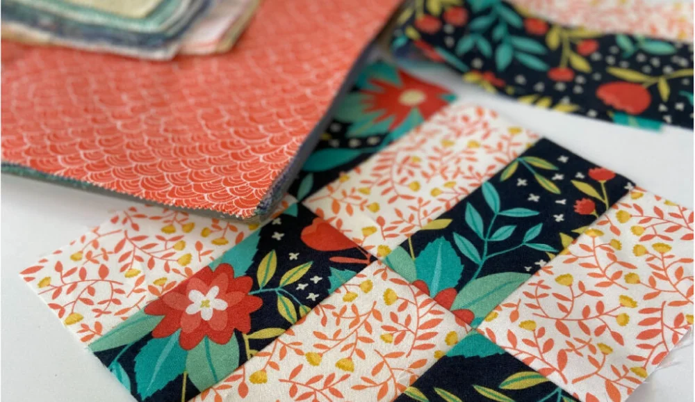cutting and piecing layer cake fabric