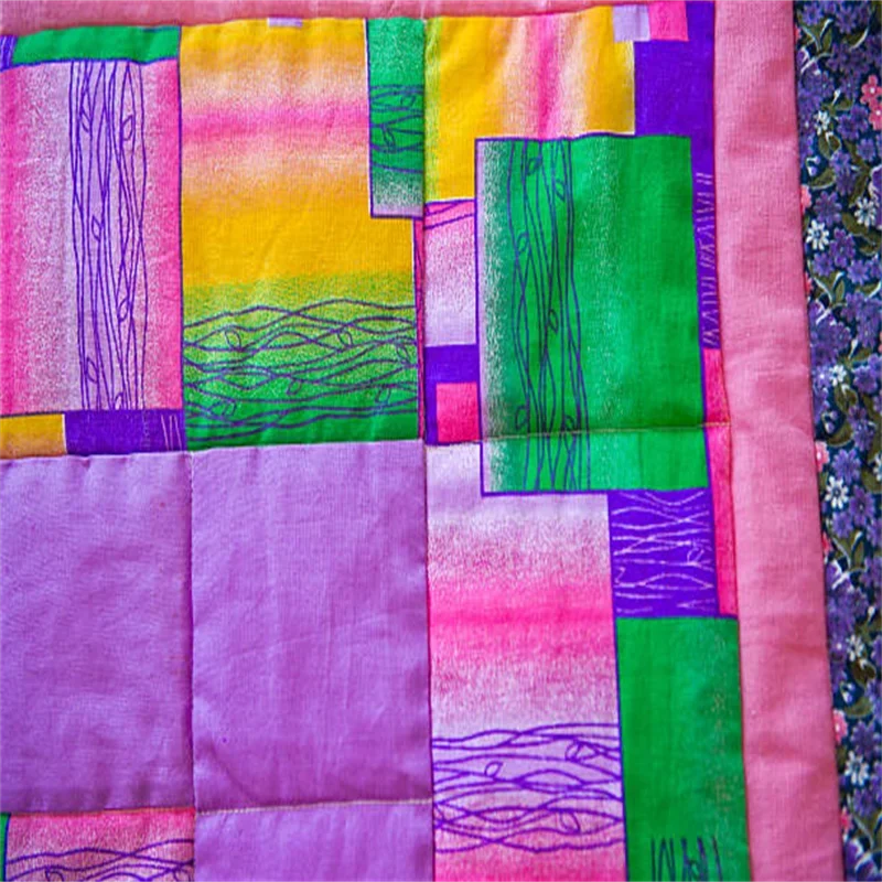 purple and green quilt fabric